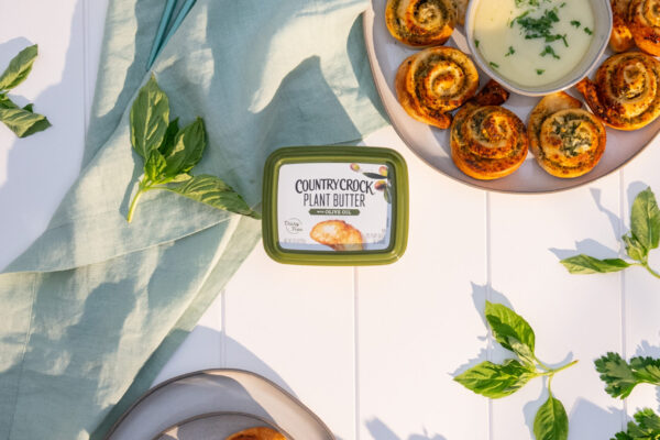 Air Fryer Spring Pesto Rolls Air fryer pesto rolls elegantly presented on a pristine white surface, showcasing the featured product at the center. Ideal for capturing the appetizing allure and culinary versatility sought by food CPG brands in their marketing campaigns.