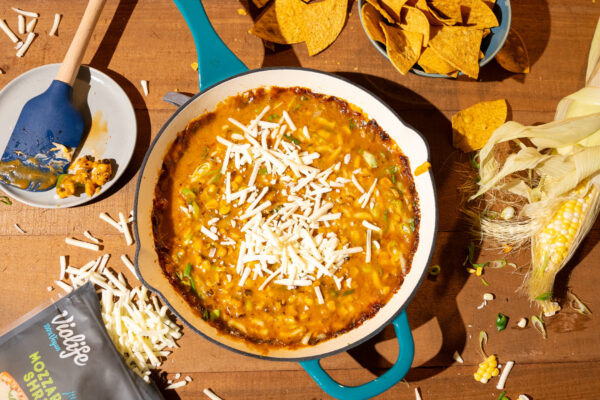 Cheesy Korean Corn Dip Cheese corn dip styled on a wooden surface to highlight the featured product.